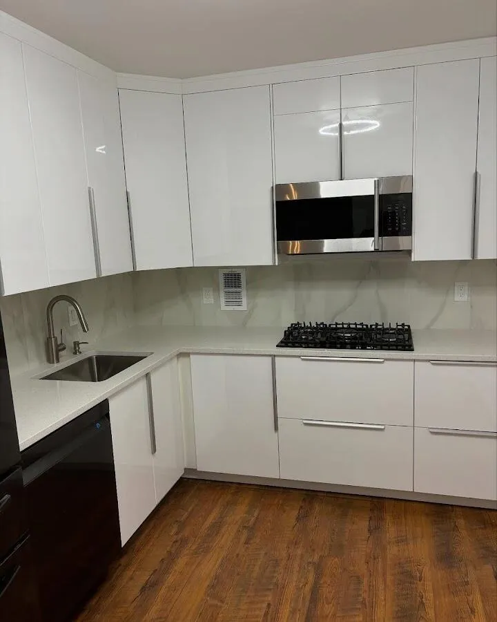 Restored kitchen with white cabinets after water damage in Bedford Heights